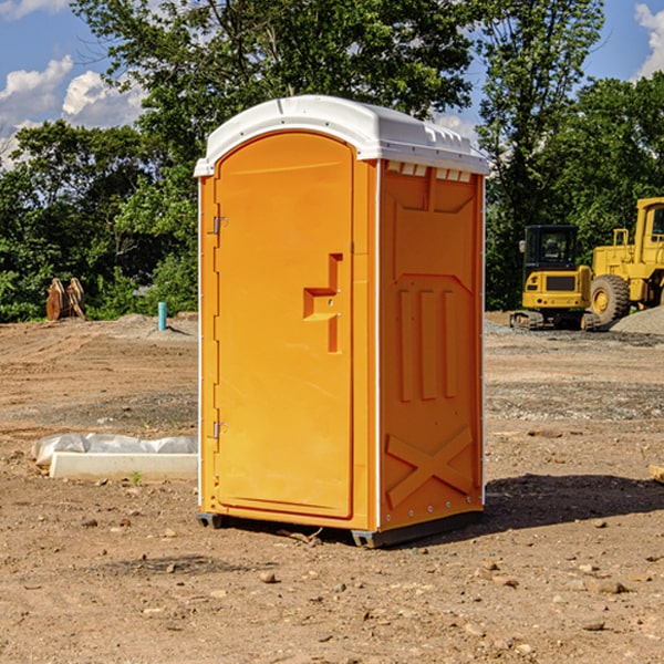 what is the cost difference between standard and deluxe porta potty rentals in Dana